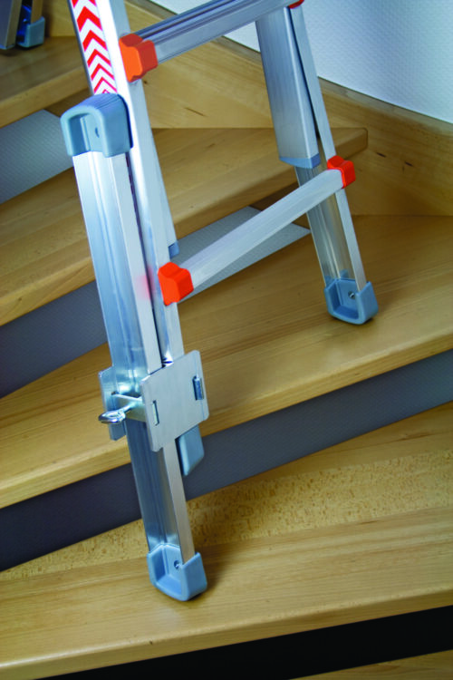 Waku Telescopic Ladder used on stairs with leg leveller accessory