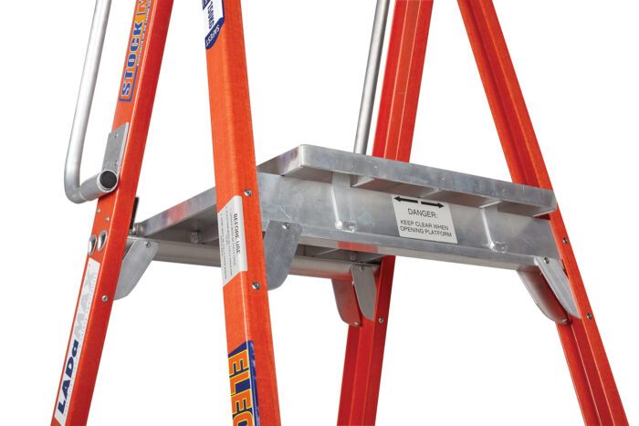 LADaMAX Fibreglass Platform Ladder, close up of platform and safety labels