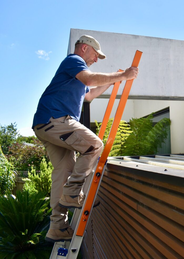 Little Jumbo Ladders Walk Thru Hand rail. Accessing roof safely from extension ladder using walk thru handrails