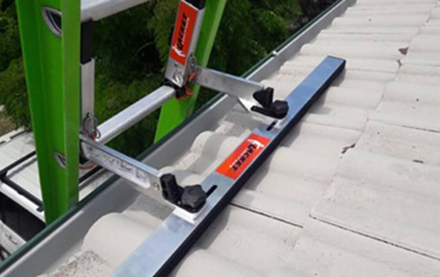 Lacket Ladder Safety demonstrated on roof.