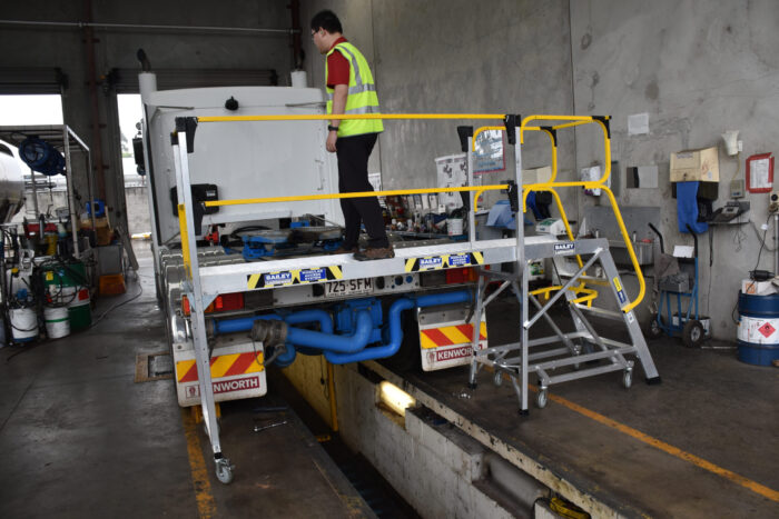 Bailey Modular Access System man accessing truck loading bay. Multi levels.