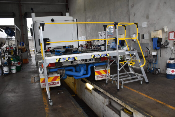 Bailey Modular Access System man accessing truck loading bay. Multi levels.